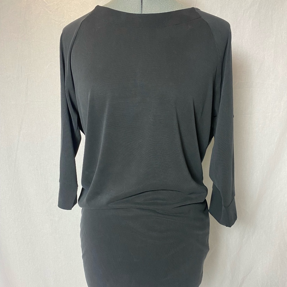 Splendid short black dress with cowl neck on back.